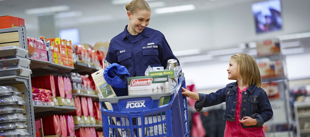 Coast Guard member shopping with child