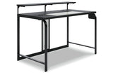 Ashley Furniture Lynxtyn 50" Home Office Desk with LED Lighting, Wireless and USB Charging