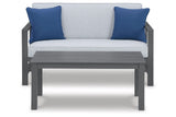 Ashley Furniture Fynnegan Nuvella Outdoor Loveseat with Coffee Table