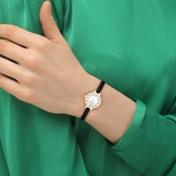 COACH Womens Iris Gold-Tone Black Leather Watch