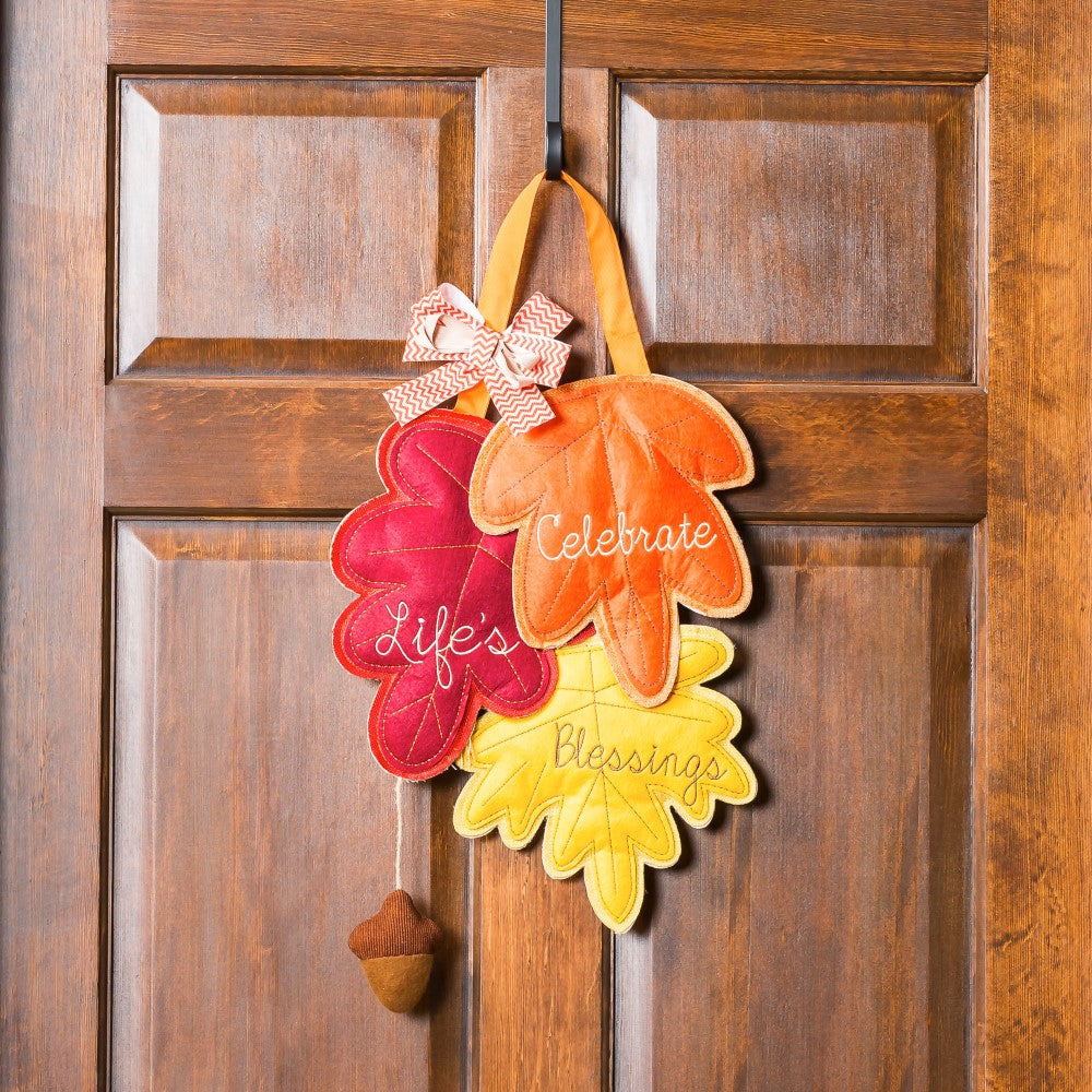 Evergreen "Celebrate Life's Blessings" Felt Door Decor