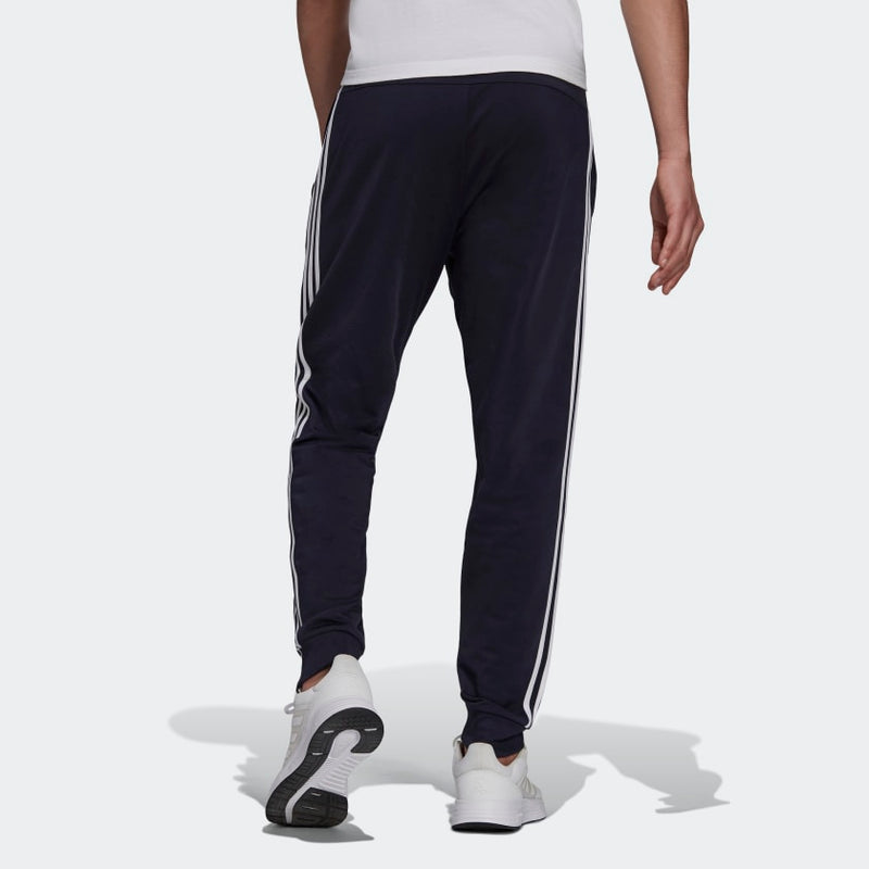 adidas Mens Essentials Warm Up Tapered 3 Stripes Track Pants ShopCGX